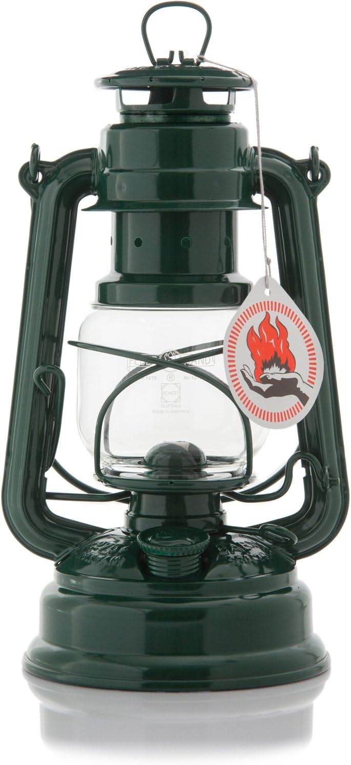 FEUERHAND lantern illuminating a campsite at night